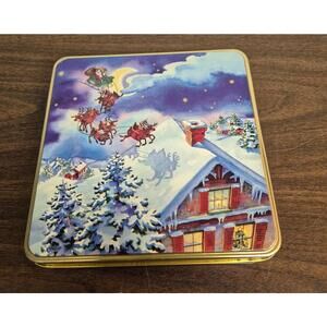 Godiva Holiday Tin with Festive Santa Design